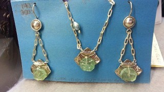 Beautiful duet in sterling with  green stone. Very unique shape and gorgeous sterling chain.
