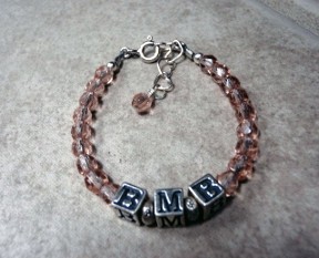 Adorable baby blocks with the initials of your child or grandchild custom created with the beads of your choosing and the length you prefer. Custom order only.